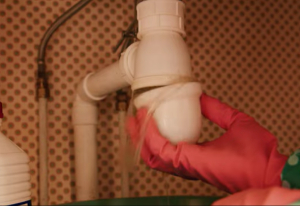 déboucher siphon douche